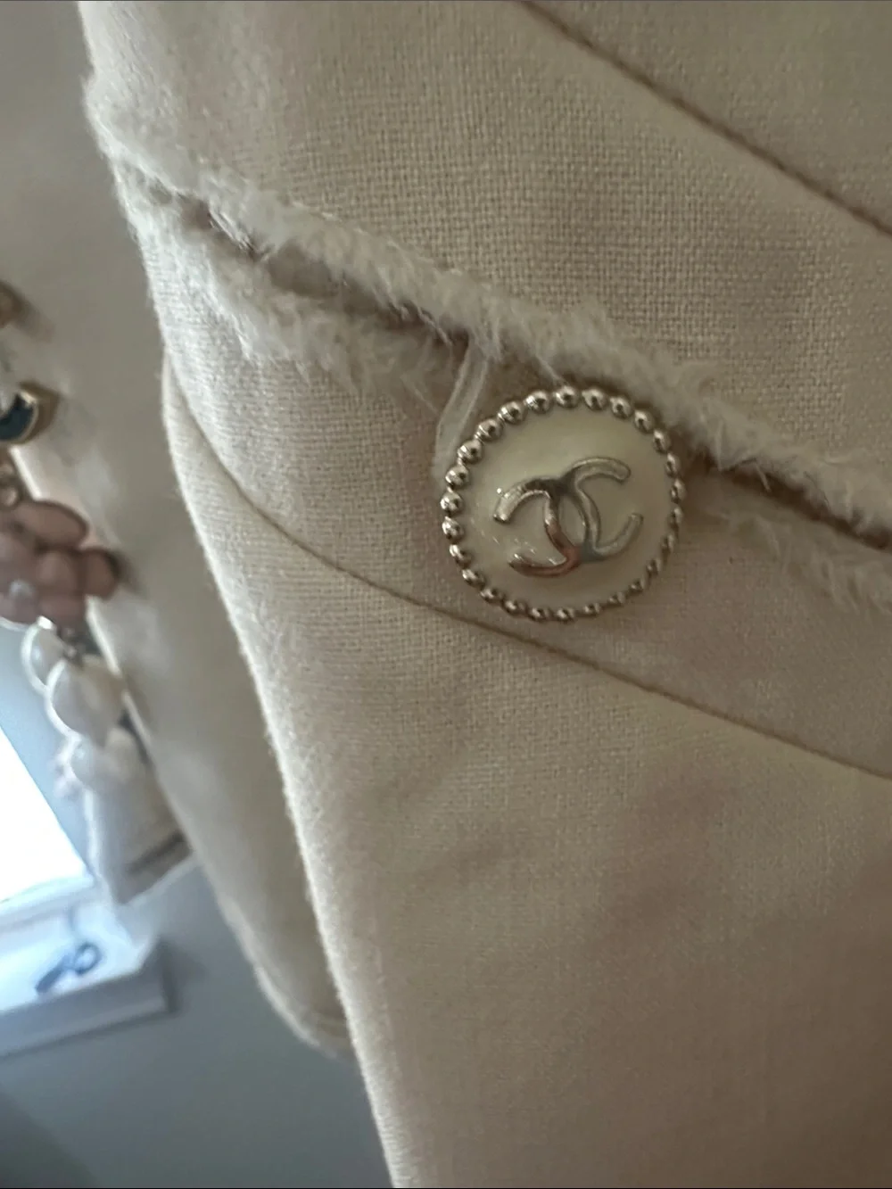 CHANEL Cream Collarless Open Jacket raw edge hem for edgy chic look gold CC